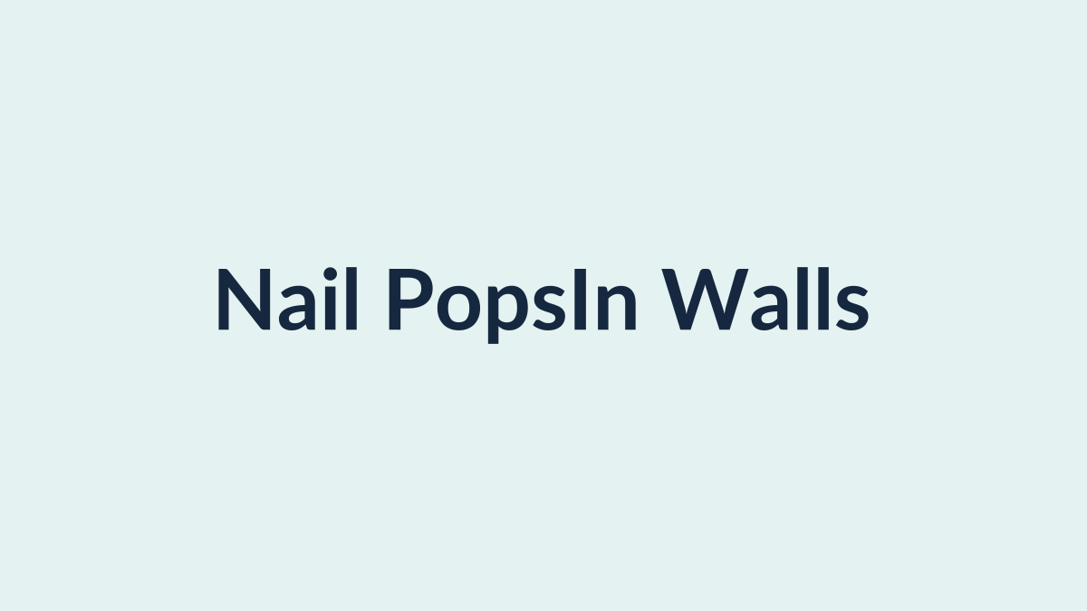 Driving a drywall screw to fix a nail pop in a wall